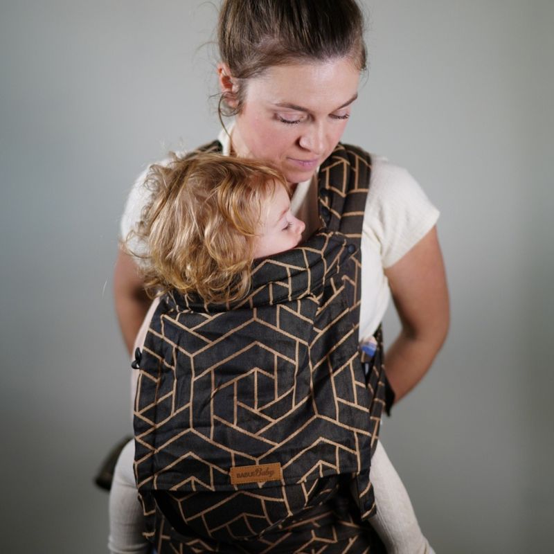Babuebaby carrier in fractal worn on the front with baby supported
