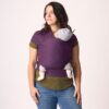 Woman in deep plum Kitoto stretchy wrap looking away from camera