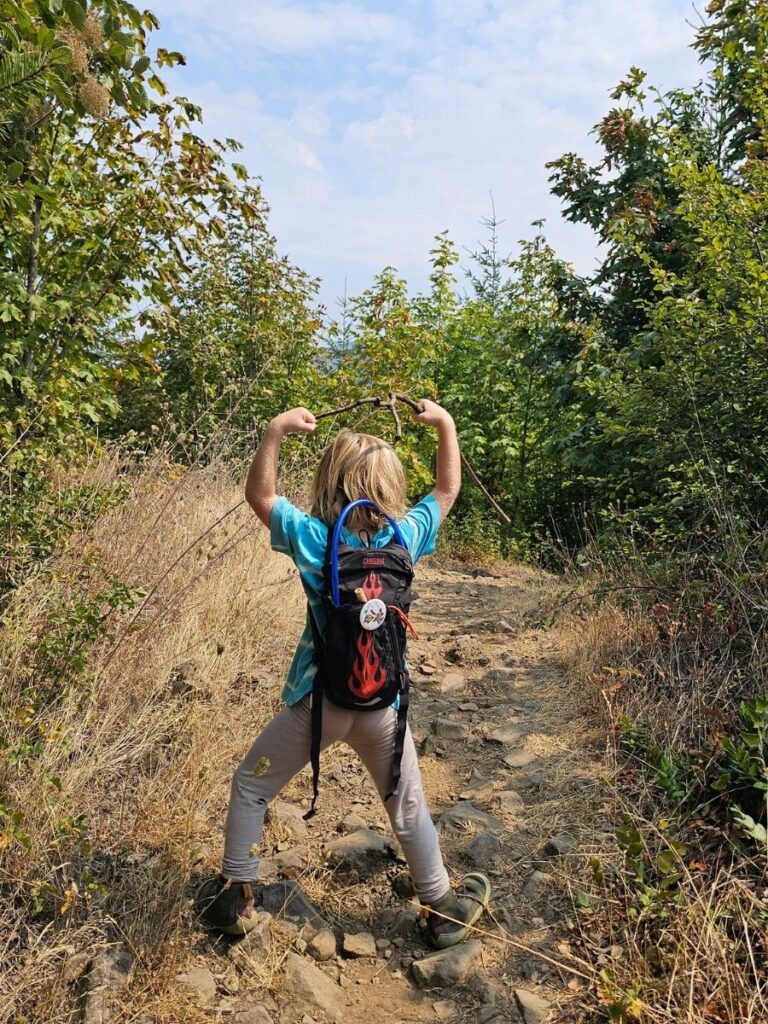 Kid walking on hiking trail